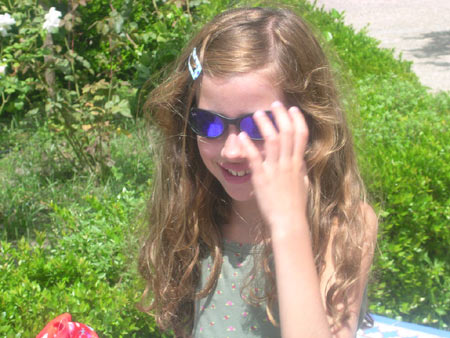 The girl from the Kid's Club looks cool with her glasses