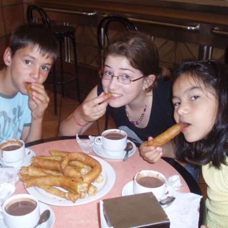 Eating churros and hot chocolate